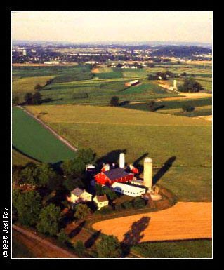 Aerial view of a Dairy, Corn, Wheat, Alfalfa, Soybean, and Pig Farm near Harrisburg, Pennsylvania.