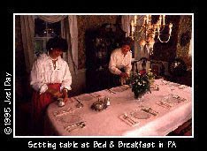 Setting dinner table in historic home for Bed & Breakfast Guests near Donegal Springs, Pennsylvania.