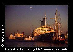 Fleet of cruise ships, pleasure craft, and other ships (including the Achille Lauro) moored to Victoria Quay at the Port of Fremantle in Western Australia.
